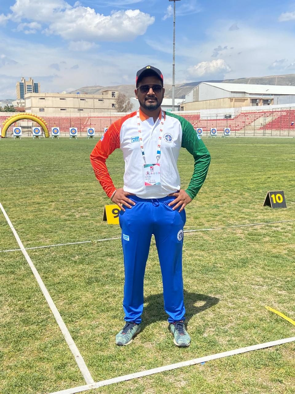 Dr. Karanbir Singh at an archery competition field