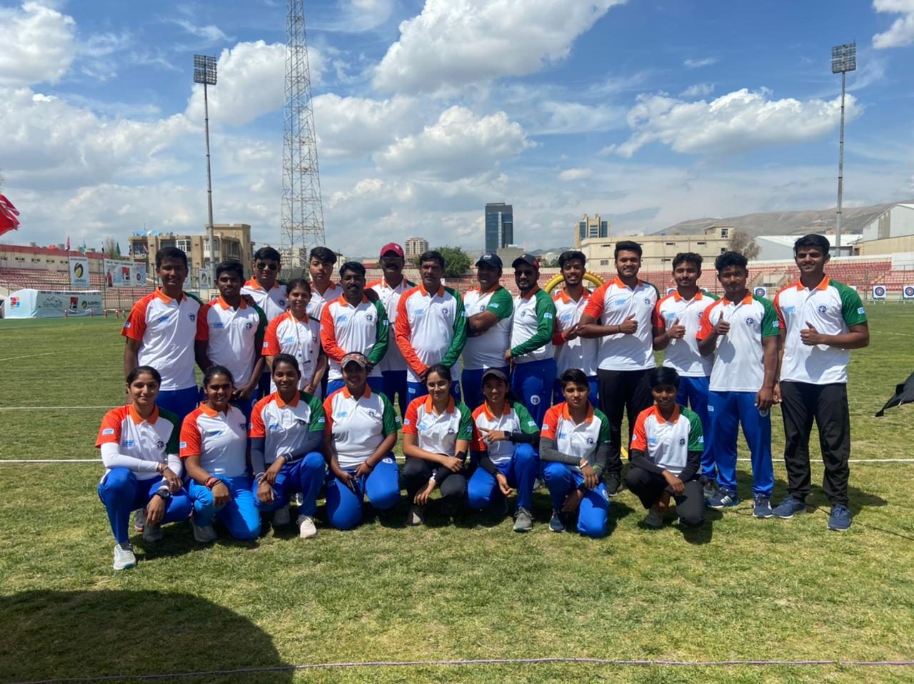 Archery team group photograph at competition venue