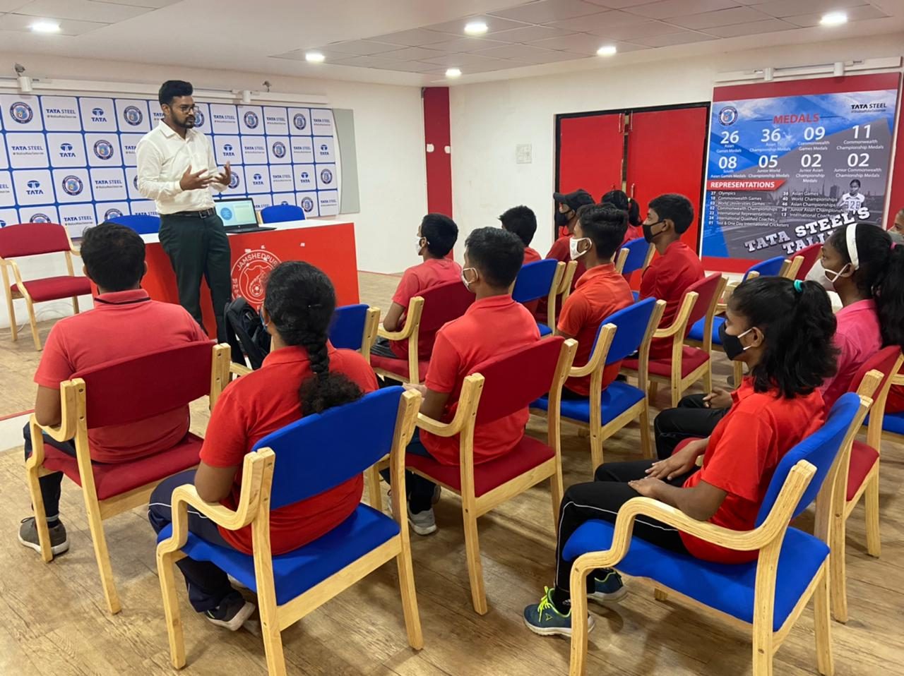 Dr. Karanbir Singh delivering an indoor mental skills talk