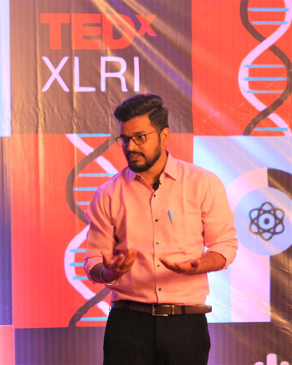 Dr. Karanbir Singh speaking at a TEDx event